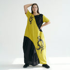 Oversize Maxikleid in Sonnengelb Schwarz mit Pinselstrichprint asymmetrisch aus Jersey
