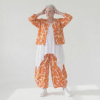 Ausgefallene Ballon Hose im legeren Lagenlook mit luftig leichter Popeline und Batik Muster, Orange/Weiß
