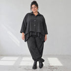 Schwarze Denimballonhose mit Stretch und bequemem Schlupfbund in weiter Passform